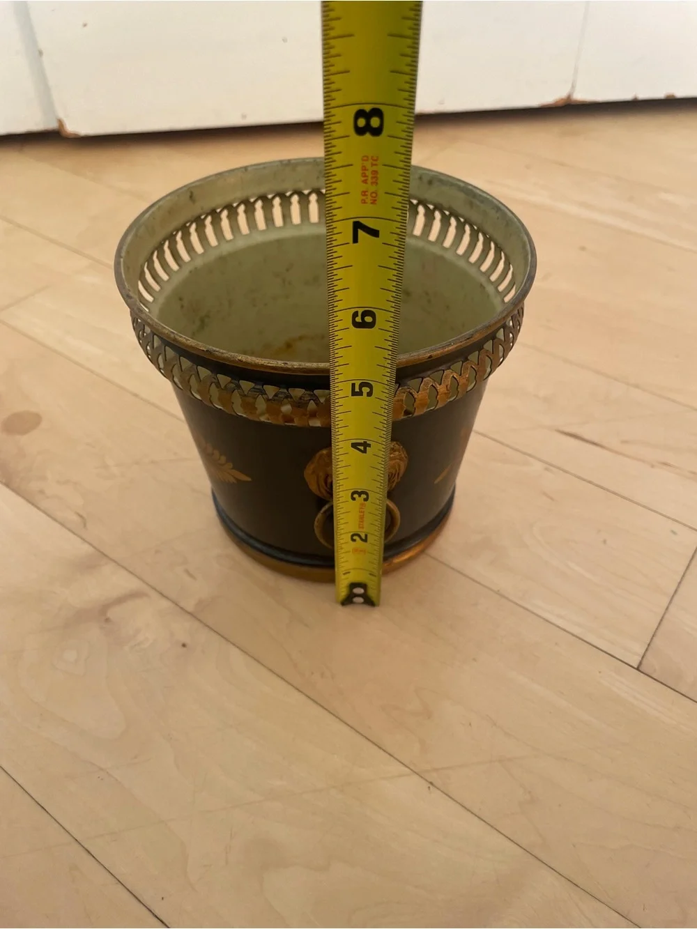 vintage French Neoclassical-style black and gold tole cachepot